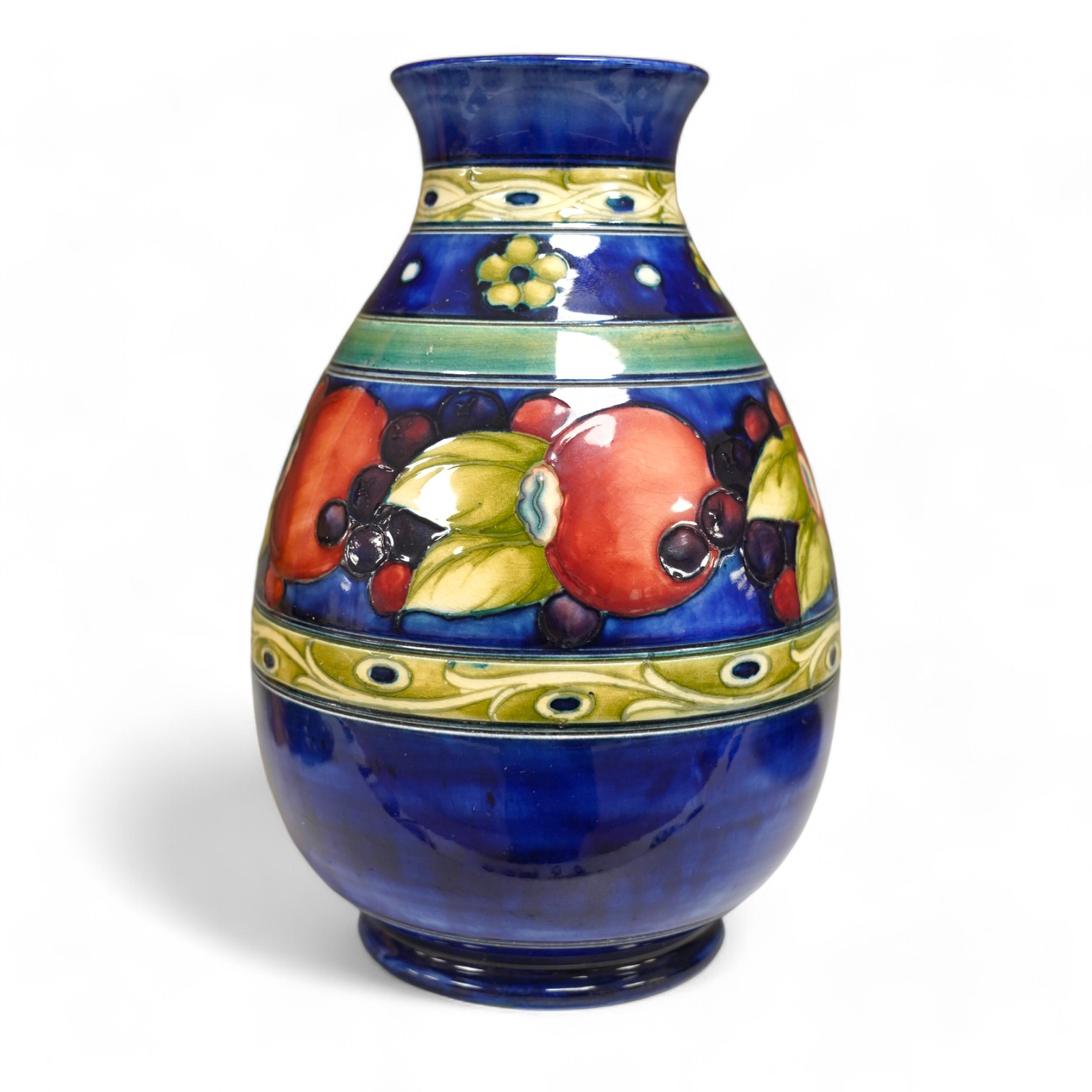 A Moorcroft banded pomegranate ovoid vase, 1930s, signed, 24cm high. Condition - good